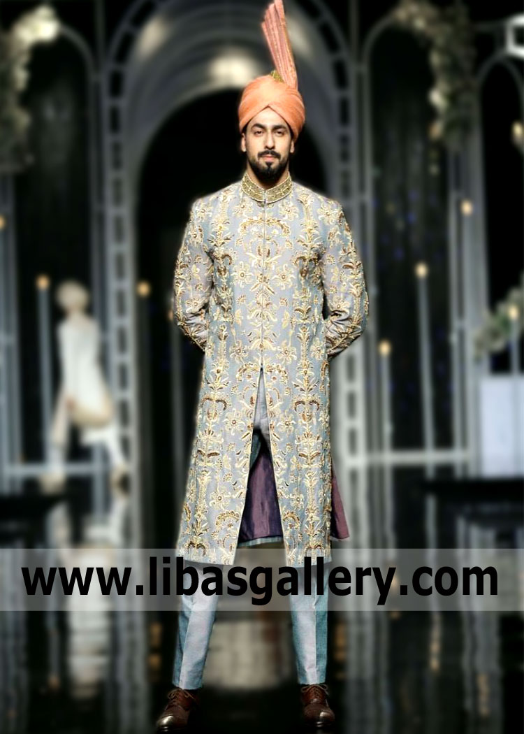 Stylish version of a mens Sherwani suits.A man in Arsalan Iqbal Bespoke Sherwani suits Hertfordshire England UK Gorgeous Embellished Mens Sherwani suit is the ideal dream. After all,a Sherwani suit is considered a symbol of respectability,success,elegance
