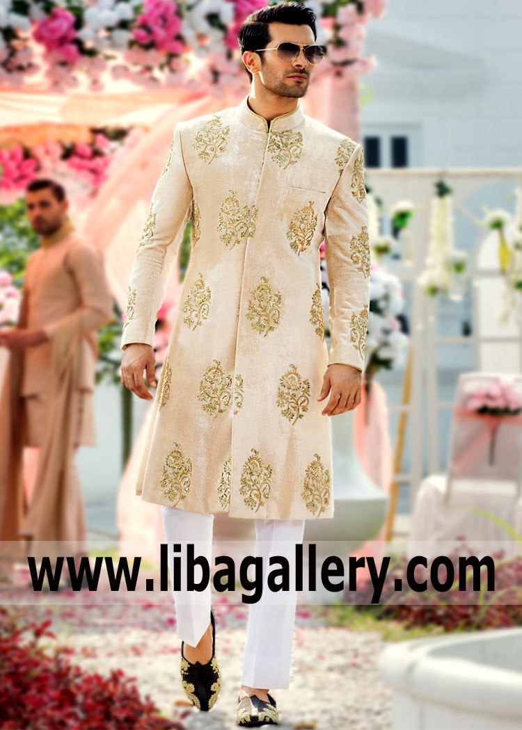 Dress brightly and boldly with Nomi Ansari Smart Looking Menswear Sherwani Oxford London UK Embroidered Sherwani Suits for Reception. A huge assortment of the most incredible wedding Sherwani suits to order and available at libasgallery.