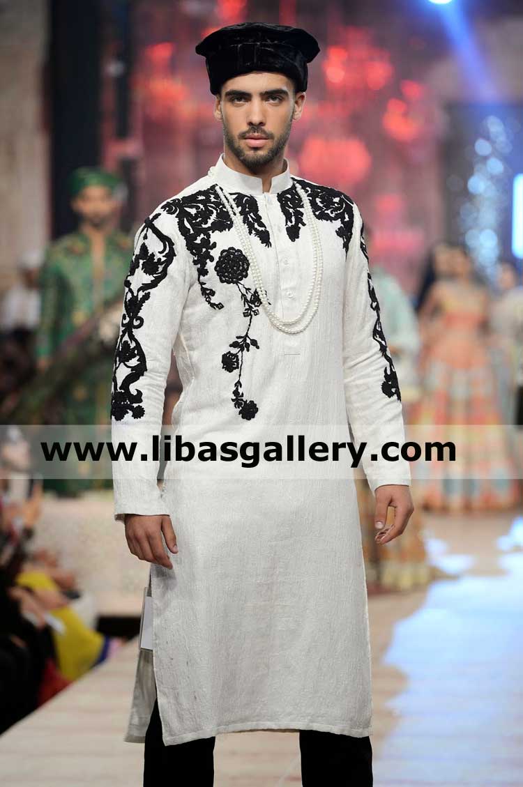 white man kurta black embroidery on front and sleeves complimented with black slim fit pajama qatar kuwait saudi arabia