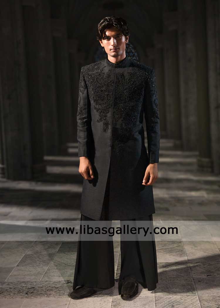 Stunning black sherwani featuring tonal embroidery and bead embellishments