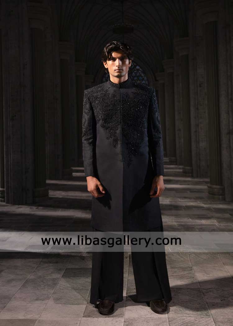 Stunning black sherwani featuring tonal embroidery and bead embellishments