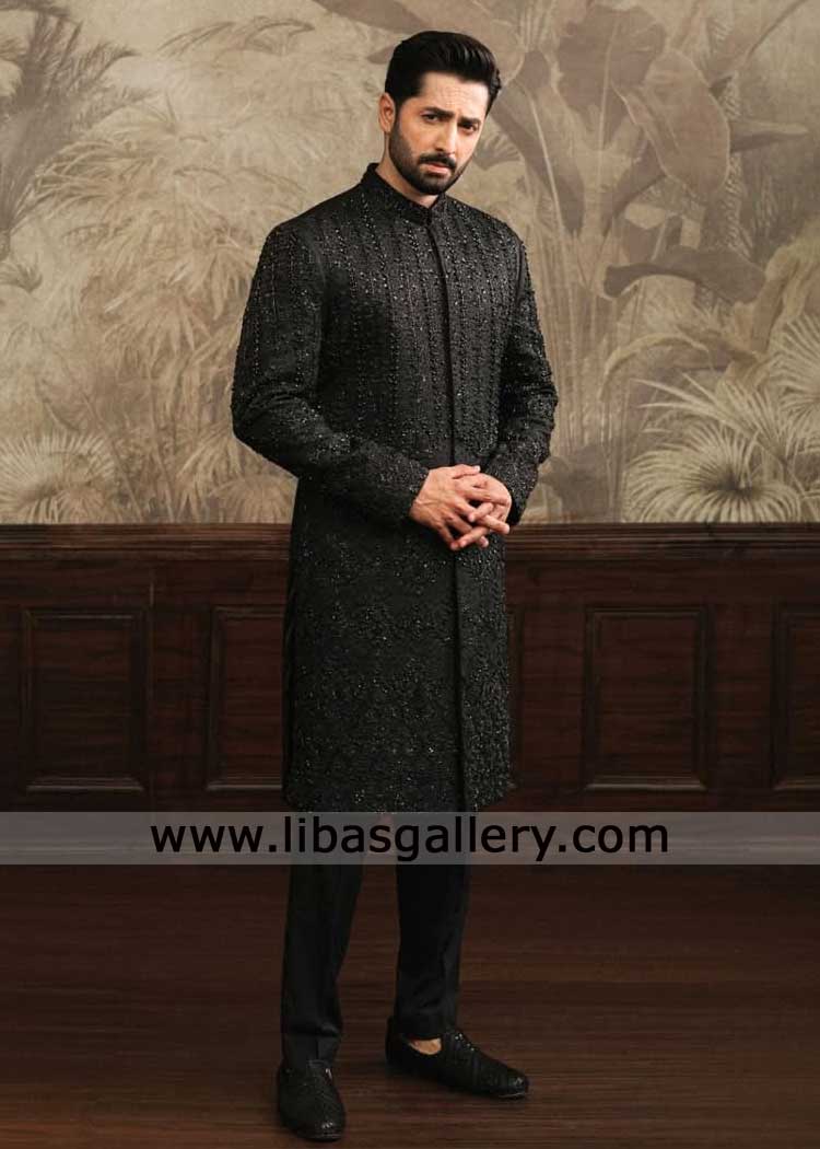 Black floral Mughal embroidery wedding sherwani for groom with hand embellishment with coordinated kurta trousers New York Illinois San Jose
