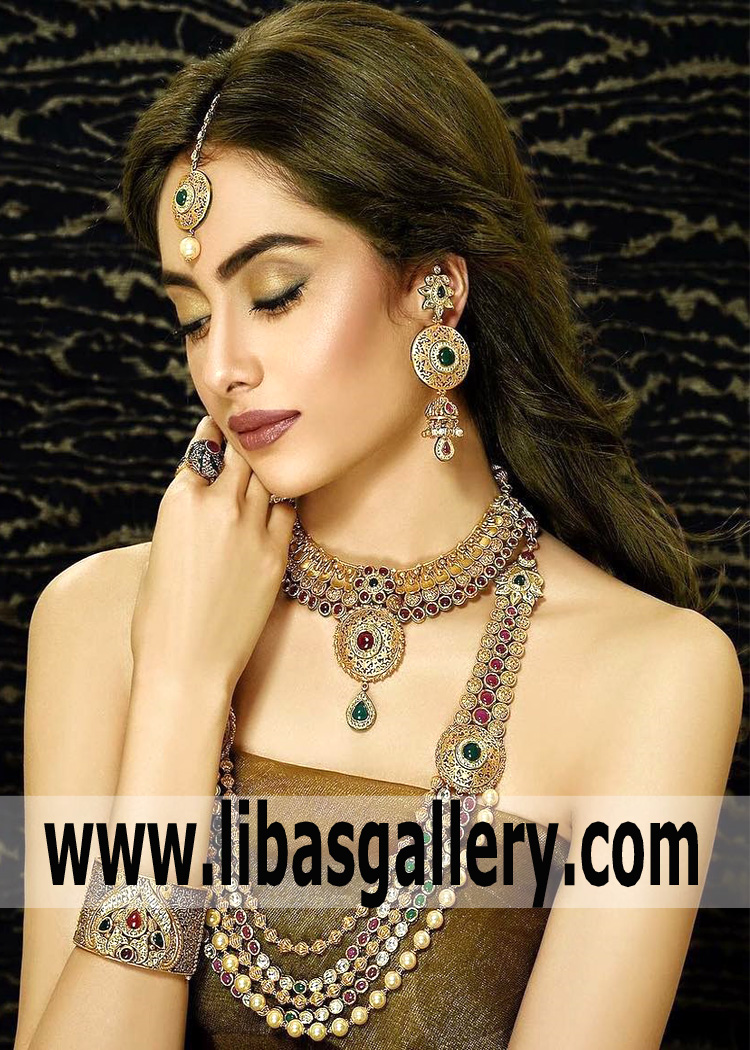 gazelle eyes of bride dreaming to start new life with groom wearing bridal jewellery set necklace rani haar earrings pair and tika dubai qatar kuwait