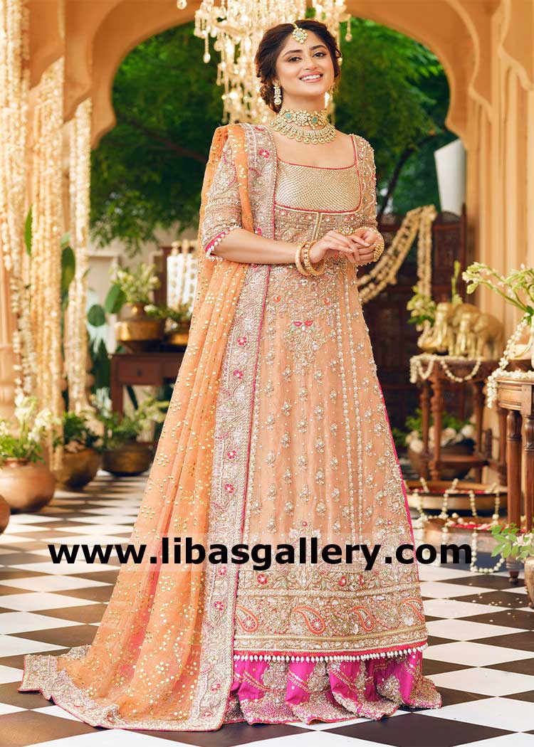luxurious bridal ensemble regal gold tissue shirt with intricate handwork and vibrant fuchsia raw silk lehenga UK USA Canada Dubai Australia