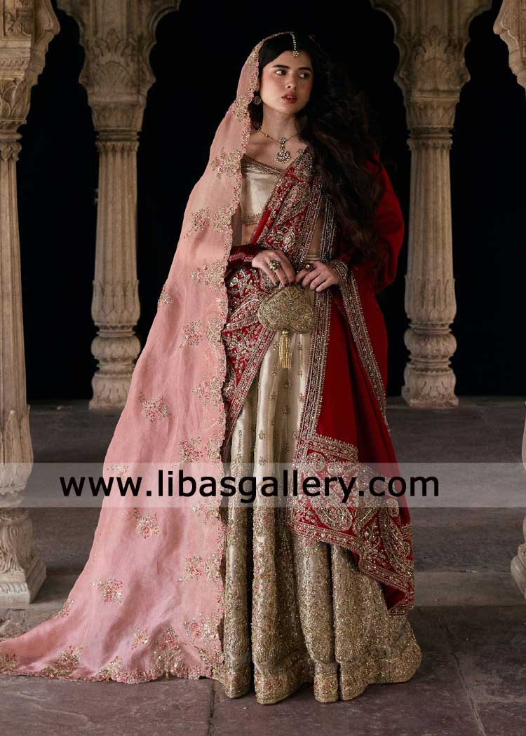 Luxurious bridal ensemble lehenga choli crafted from premium fabrics with intricate hand embellishment for wedding London Denver Dubai Washington