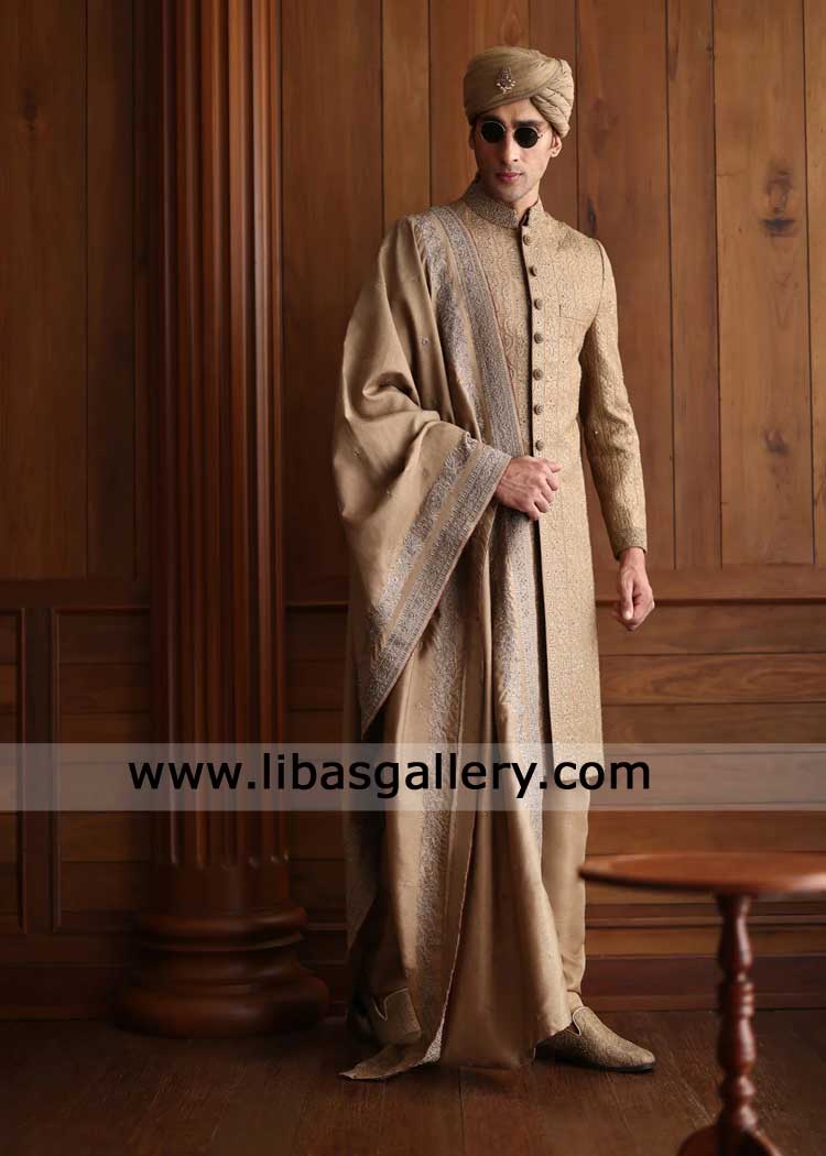 Golden brown majestic sherwani with intricate hand embellishment paired matching embroidered shawl and turban Washington Phoenix Sugarland