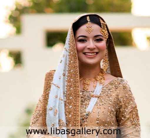 Pretty bride smile in gold plated jewellery set