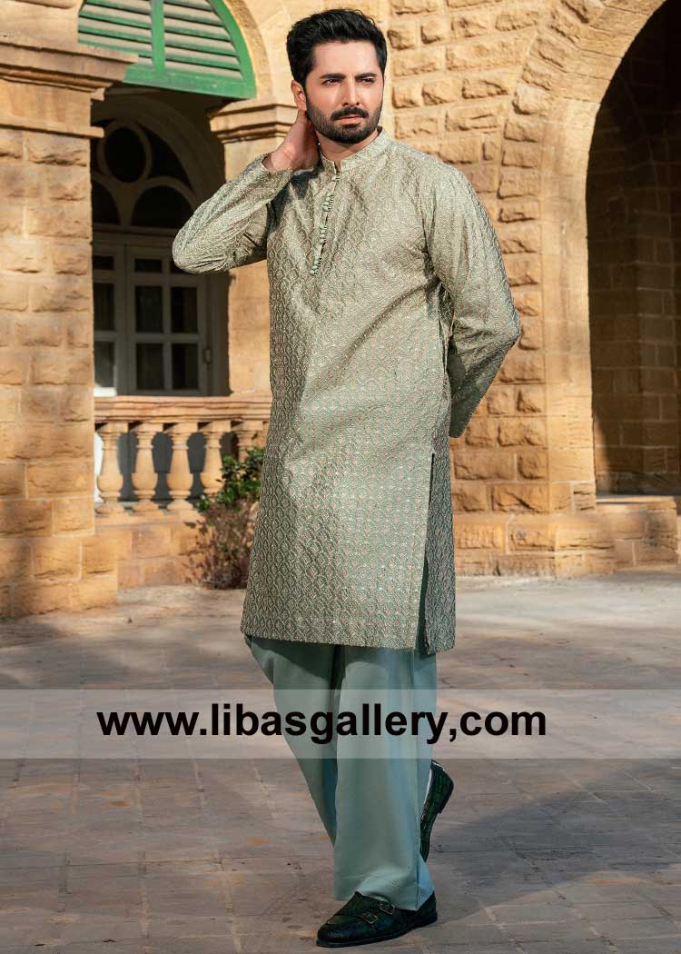 Slate Green Kurta and Pajama Set with Pleated Collar Danish Taimoor showcasing standing in an old time architecture Baltimore Vancouver Dubai UK