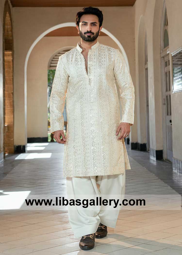 Ivory white embroidered kurta and shalwar set for Men with embellished embroidered patterns band collar and loop buttons Phoenix Philadelphia California USA