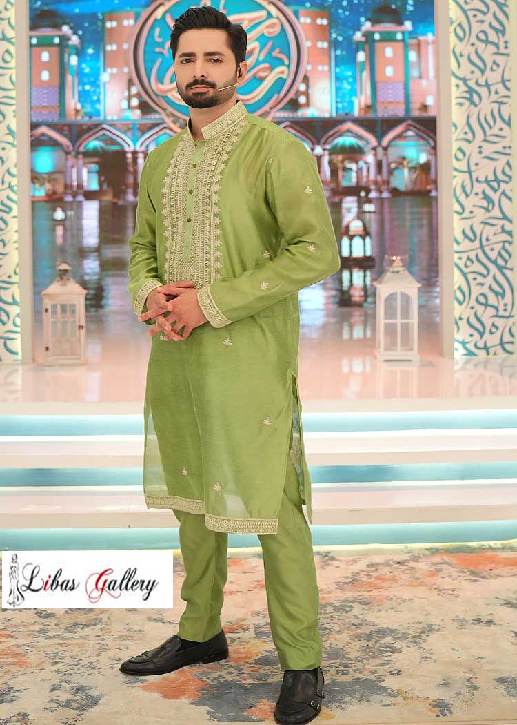 Green embroidered kurta pajama suit that sets the tone for success