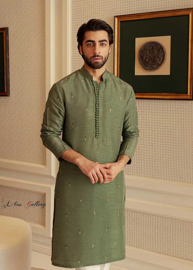 Nameer khan in Pine Green Classic Men kurta with hand fabricated Potli buttons and tiny embroidered motifs with white Pajama Riyadh Dubai Toronto