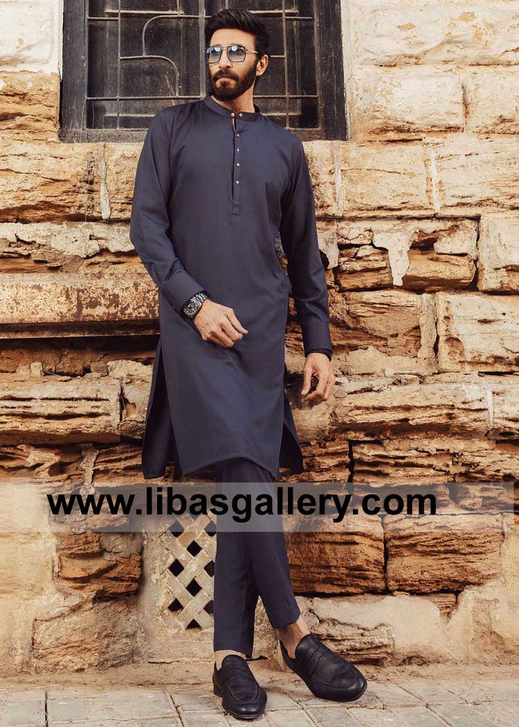 Aijaz Aslam showing latest styles of Men Kurta with Cuff Sleeves and Pajama made of same fabric and color for Eid and party Dinner Qatar Saudi Arabia Dubai