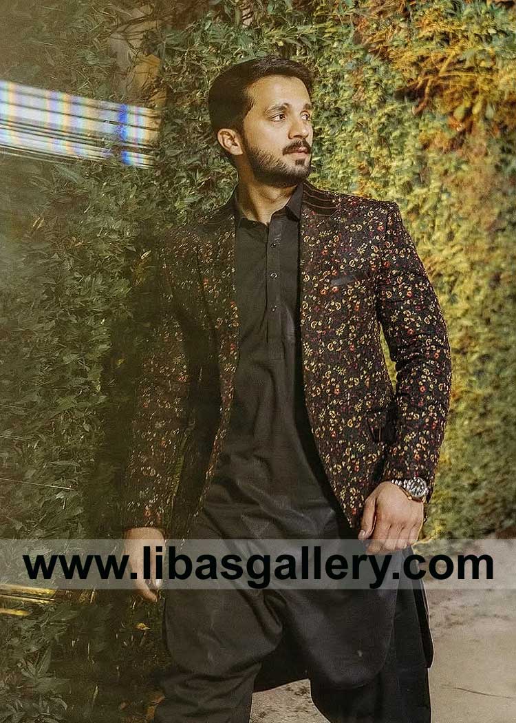 Multi embroidered jacket with plain black shalwar kameez reflects a perfect choice of outfit on Rajab Butt personality Manchester Sheffield Leeds UK