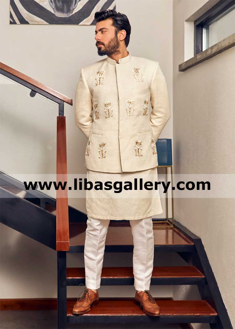 Ivory wedding groom prince suit with embroidered floral spray fawad khan standing on steps high quality pakistani prince jacket shop uk usa canada uae
