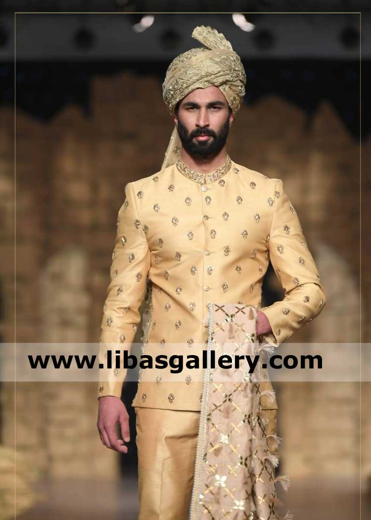 young black bearded groom on ramp in golden prince coat