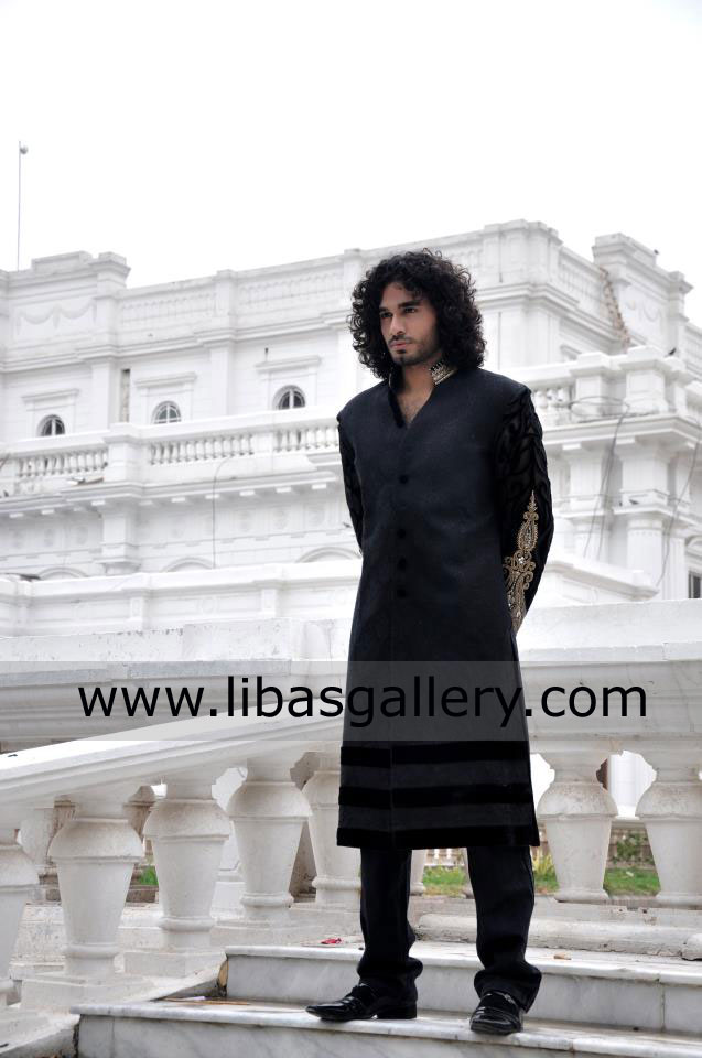 black wedding sherwani embroidery on sleeves curly hair groom enjoying nikah with barat Saudi Arabia Qatar Kuwait