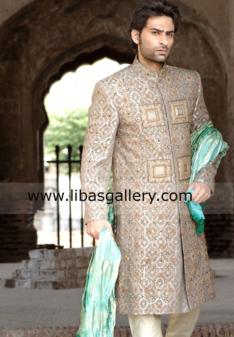 charming man waiting for his bride in designer wedding sherwani jamawar buy online from sherwani store libas gallery UK USA Canada