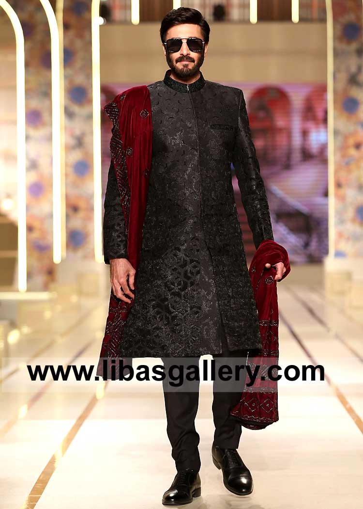 Aijaz Aslam in Black shade Fancy Embroidered Sherwani for Nikah Barat Look paired with matching Inner and Red Embroidered Groom Shawl France Qatar Germany