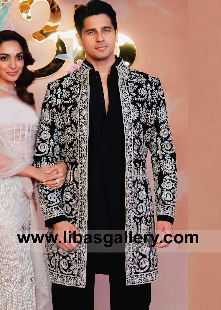 Black Wedding Sherwani for Groom with ivory Dori and Badla hand embellishment paired with kurta and trousers Sugarland Toronto Dubai London Sydney