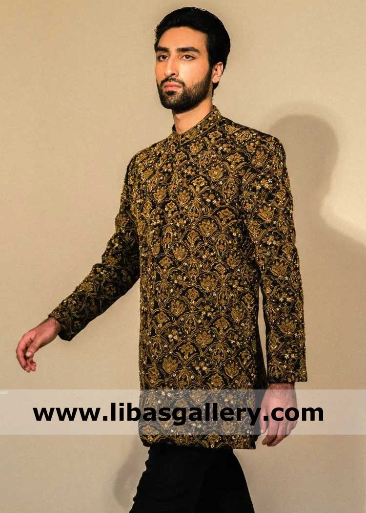 Black nikah wedding sherwani suit with antique gold hand work all over on raw silk paired with matching kurta trouser naperville buffalo chicago usa