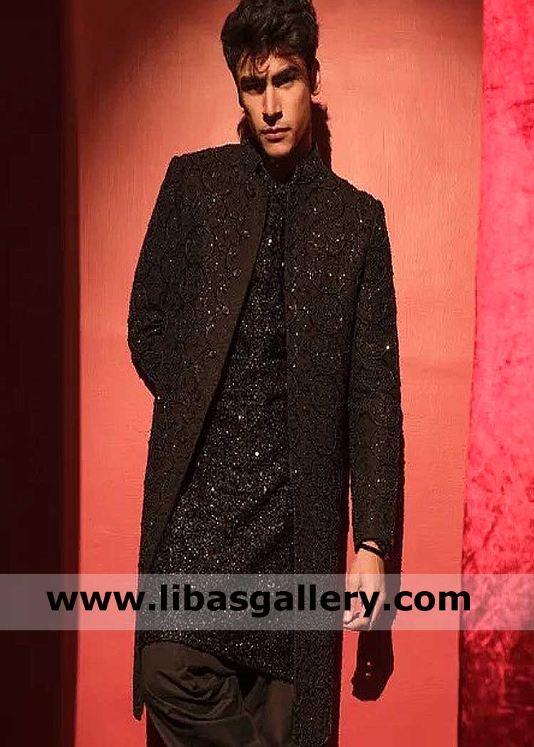 Black heavy embroidered groom sherwani ensemble