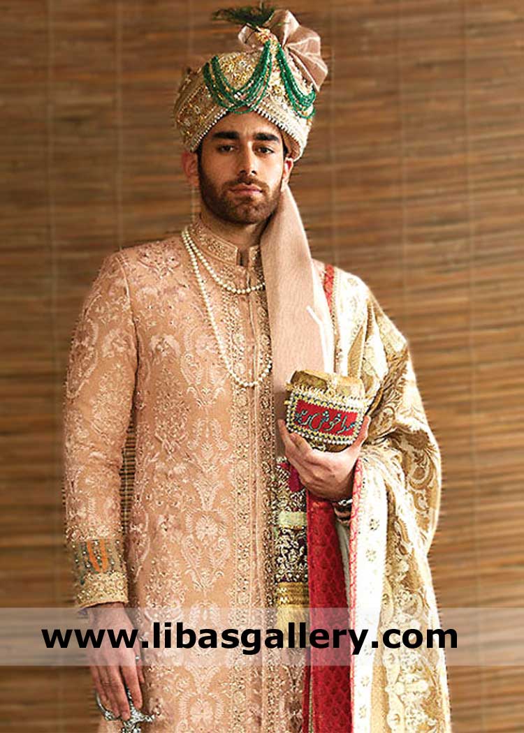 Heavy Embroidered peach groom sherwani ensemble