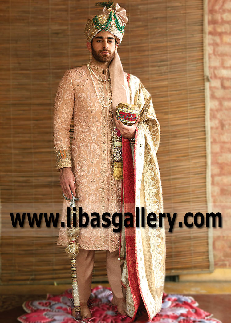 Heavy Embroidered peach groom sherwani ensemble