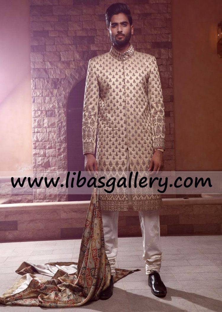 Enthusiastic groom in designer nikah sherwani article all over front hand embellishment custom made sherwani article Cardiff Swansea UK