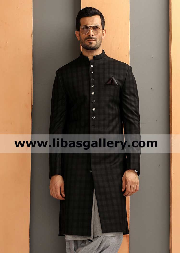 Dapper tall man in artistic traditional sherwani suit