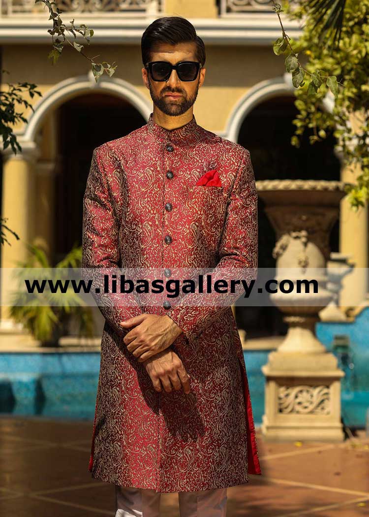 bold and robust pakistani groom wedding sherwani ensemble in high quality cotton fabric maroon color perfect fitting france germany sweden