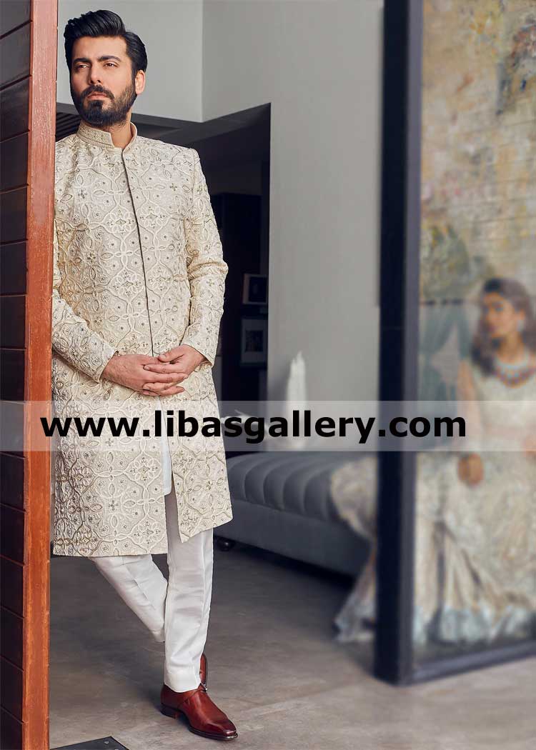 Beige embellished sherwani with patterns borrowed from Islamic jaals