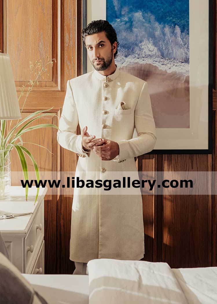 Delicate handcrafted collar corner motif ivory groom wedding sherwani design in karandi fabric ahad raz mir serious mood dubai uk usa canada