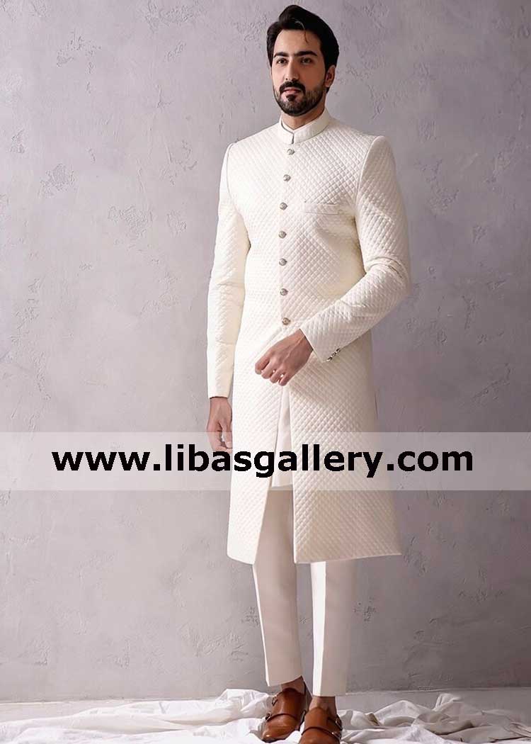 Sweet spoken groom wearing designer nikah barat sherwani 