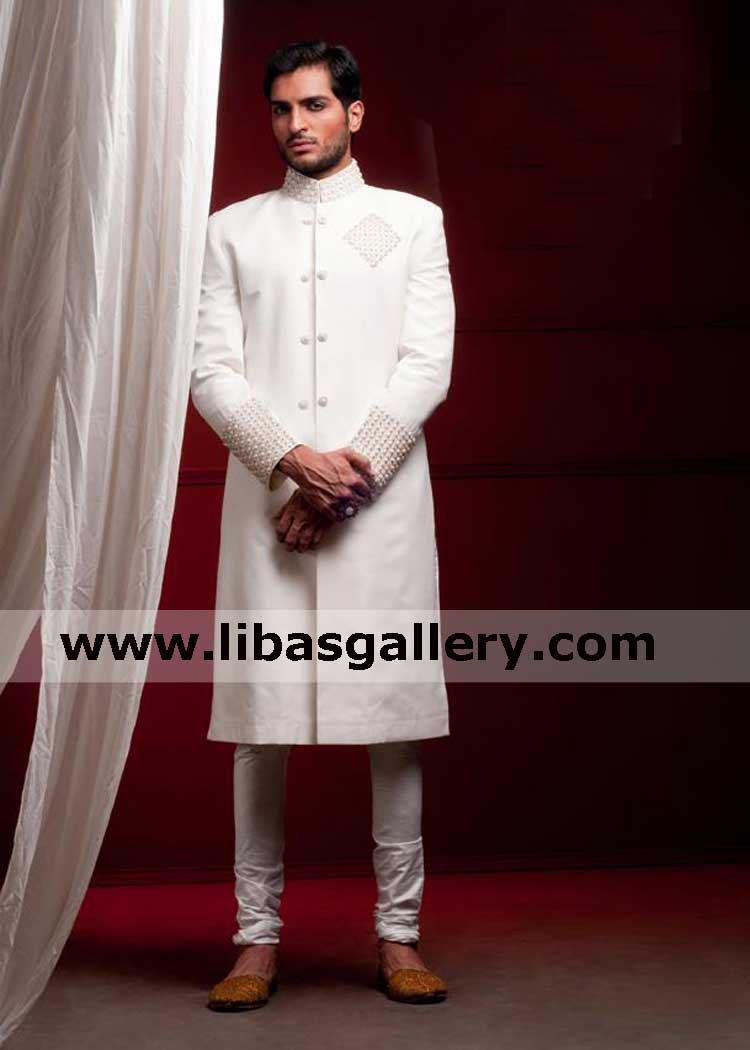 Jaw drop latest white groom wedding sherwani design omar shahad showing nicely nikah barat sherwani hand embellished shop online qatar saudi arabia kuwait