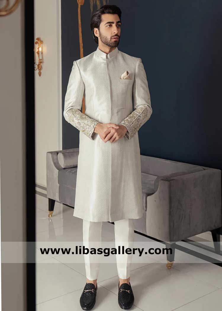 Groom sherwani in silver jamawar with gold hand embellishment on sleeves by kora dabka crystal to adorn Indianapolis Dallas Louisville New York USA
