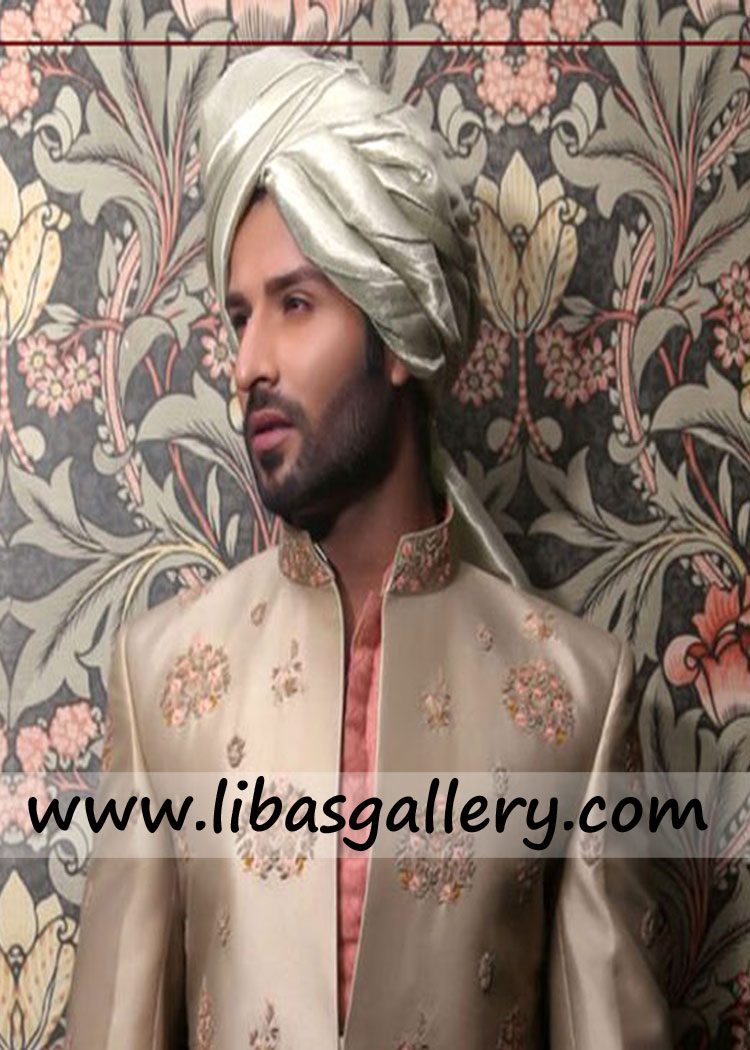 innocent muslim groom presenting designer turban pretied on wedding in light shade al rayyan doha qatar
