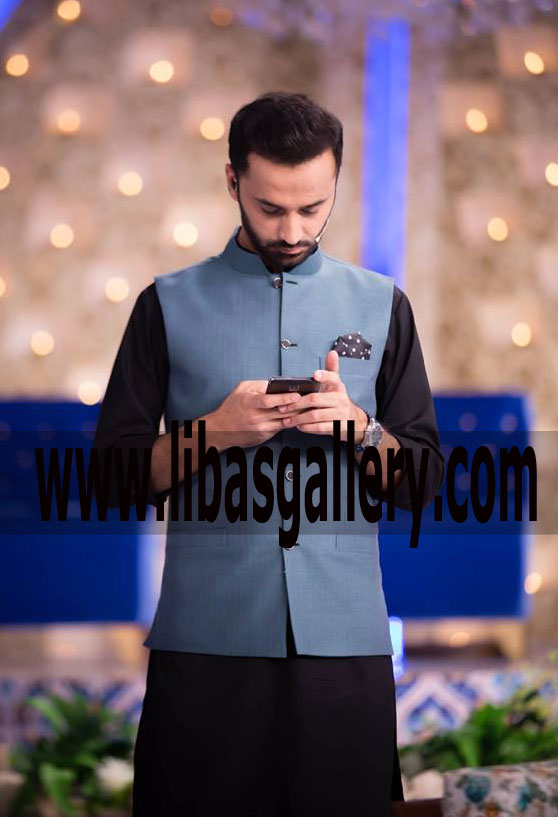 Host Waseem Badami Checking Cell phone in Waist Coat Suit with kurta shalwar looking nice on him UK,USA,Canada,Saudi Arabia,Germany