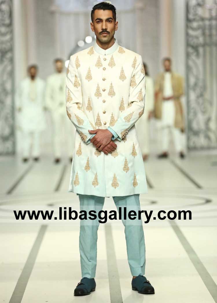men off white sherwani short length with block print motifs paired with inner kurta pajama