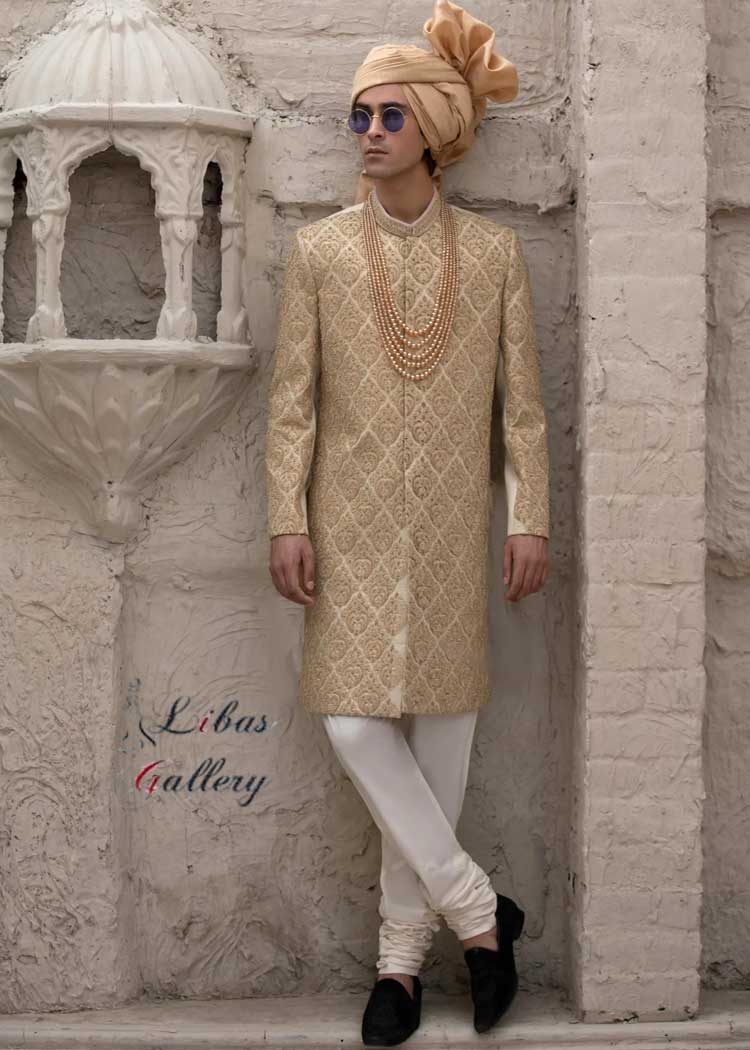 GOLD GRANDEUR EMBROIDERED SHERWANI FOR GROOM with matching turban white inner shirt trousers and gold mala New York City Los Angeles Chicago